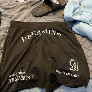 Black Graphic Shorts with White Text